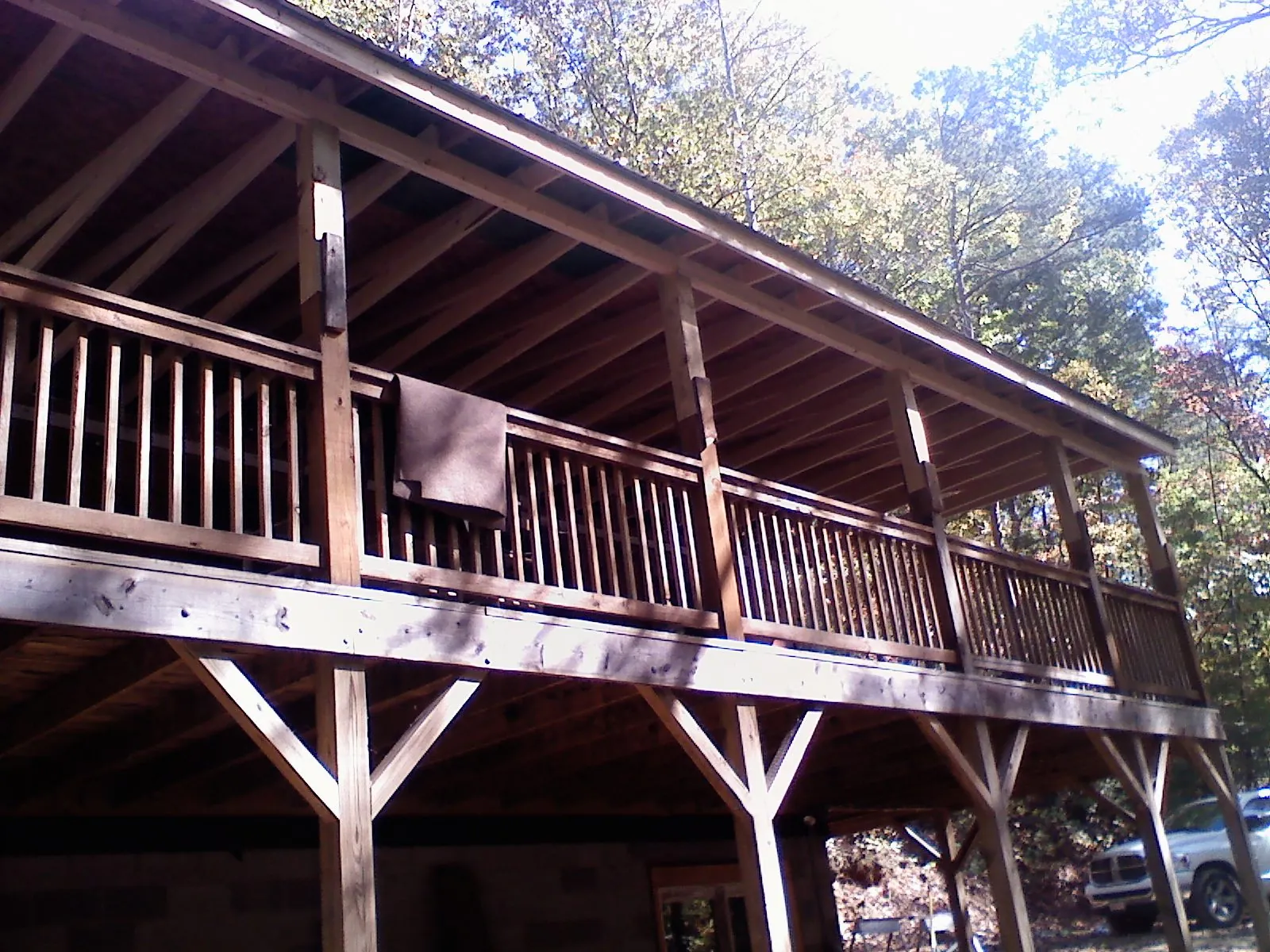 Timber framing under a new elevated porch and deck — Roof Leak Repair in Deal by Roofing Brothers